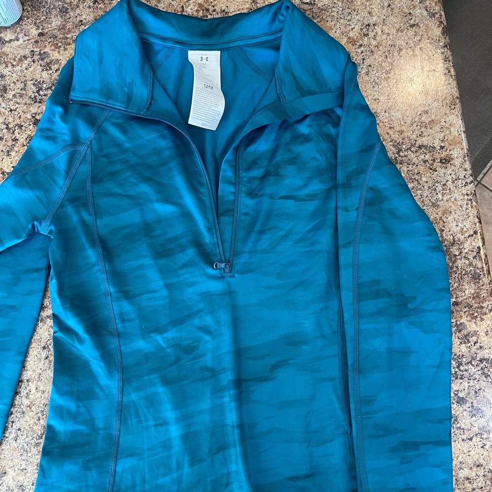 New! UnderArmour fitted long sleeve half zip Top.